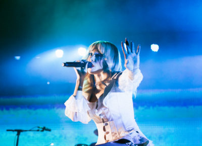 Singer Michelle Joy with mic in hand