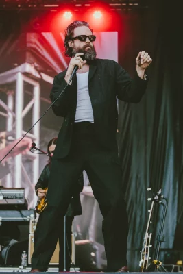 A man dancing on stage.