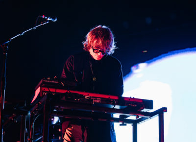 Jimmy Vallance of Bob Moses playing keyboard while on stage