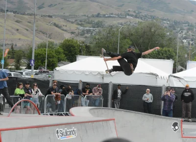 Gavin Bottger with a huge stalefish while an onlooker watches.