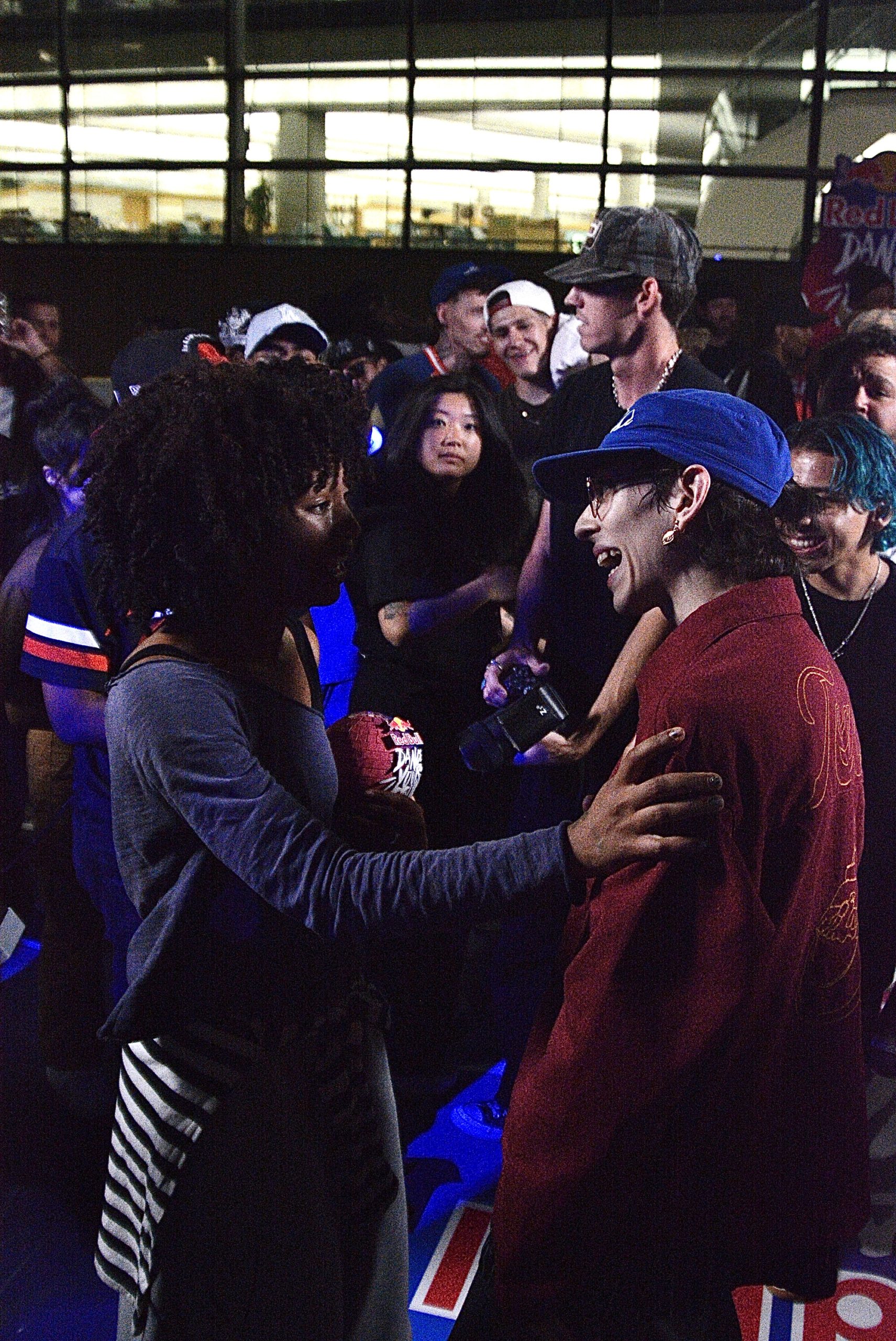 Celeste Mirra and Hyrum congratulating each other after the battle.