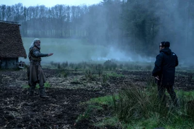 An image from the set of The Death of Robin Hood. Actor Hugh Jackman is photographed communicating with the film crew between takes. Photo courtesy: Studio A24