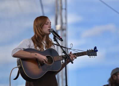 Artist Bella White soulfully sings into the wind on the Ford mainstage. Photo: Steve Olpin
